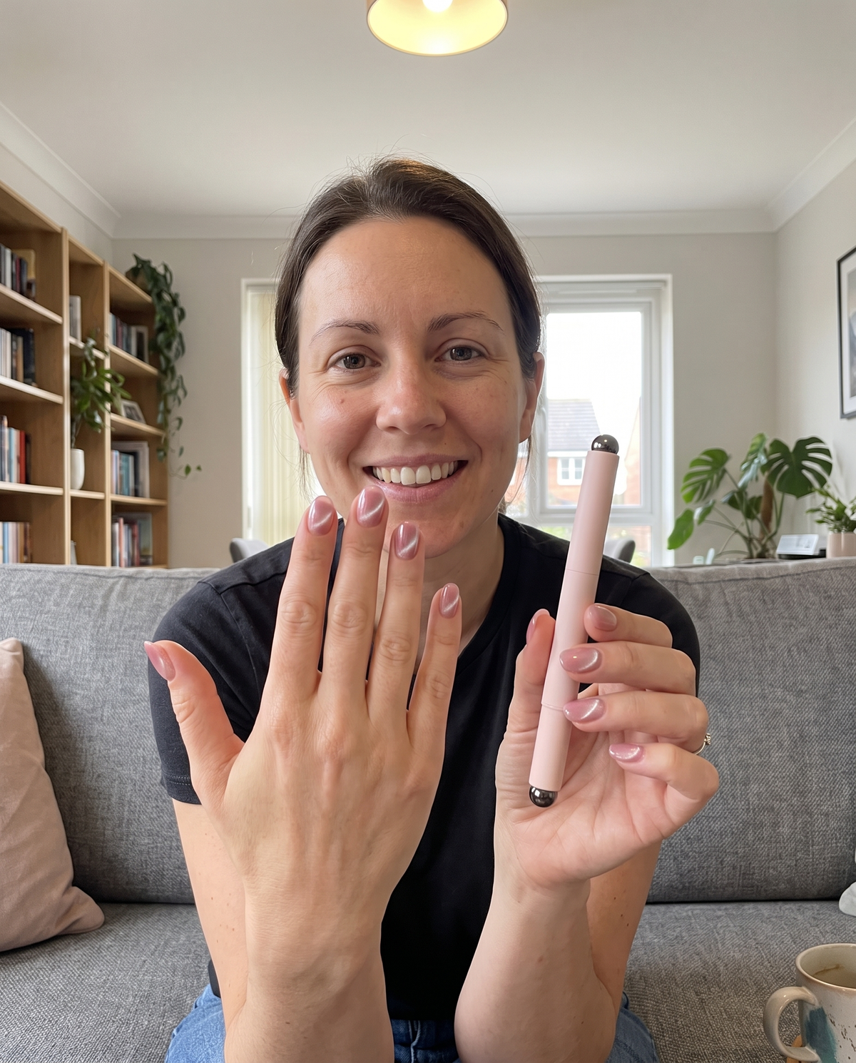 Showing off cat eye nails on the sofa with the Lumia pen